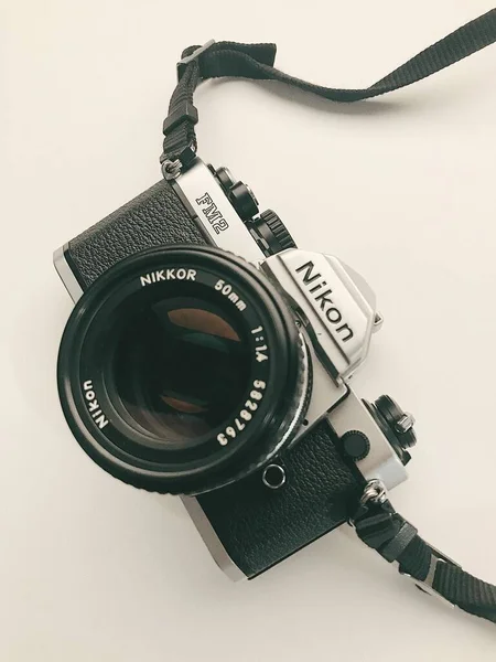 old camera with a photo of a vintage slr cameras on a white background