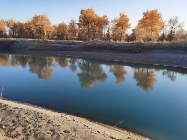 stock image beautiful landscape with a river and a lake in the background