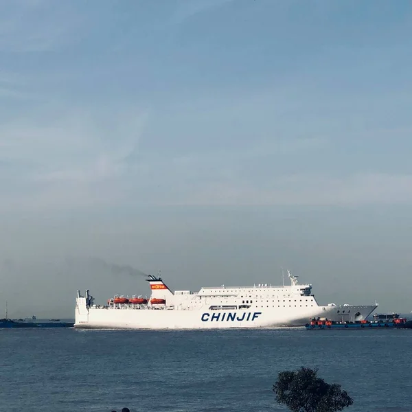 the sea and the ship in the background