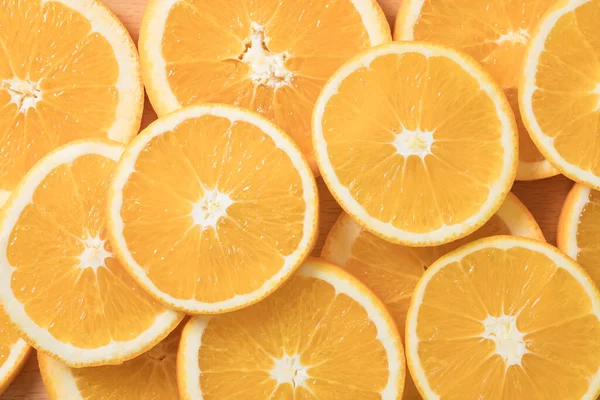 slices of orange and lemon on a white background