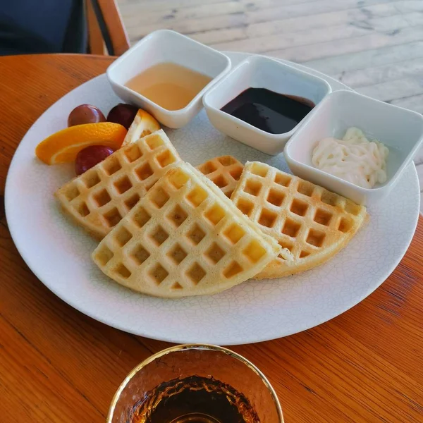 breakfast with waffles and waffle jam