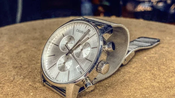 old watch on the background of the clock