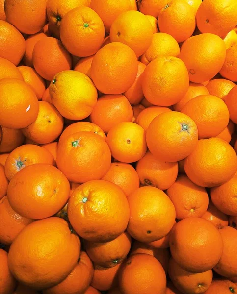 fresh ripe oranges on a white background