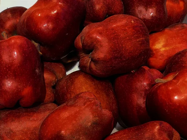 red apples on a white background