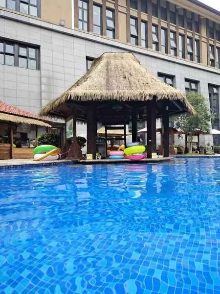 beautiful woman swimming pool in hotel resort