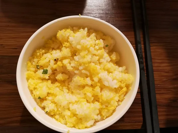 rice porridge with egg and cheese