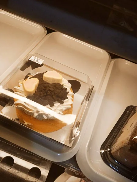 close up of a white and blue ice cream in a box