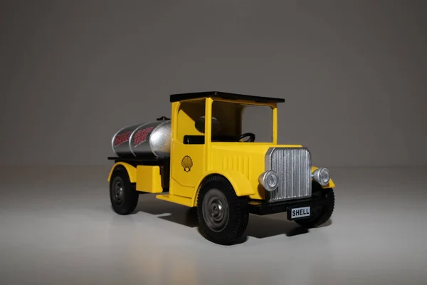 yellow toy truck on a white background