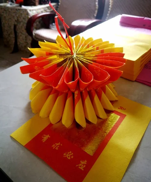 red and yellow wedding decoration with flowers