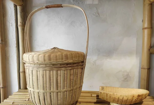old wooden basket with a wicker baskets
