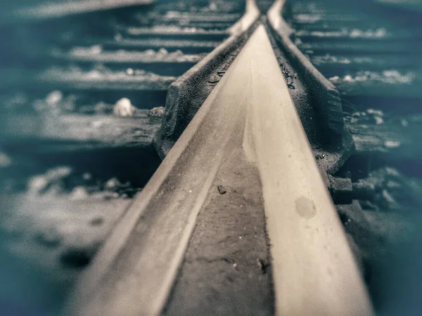 view of the railway tracks on the road