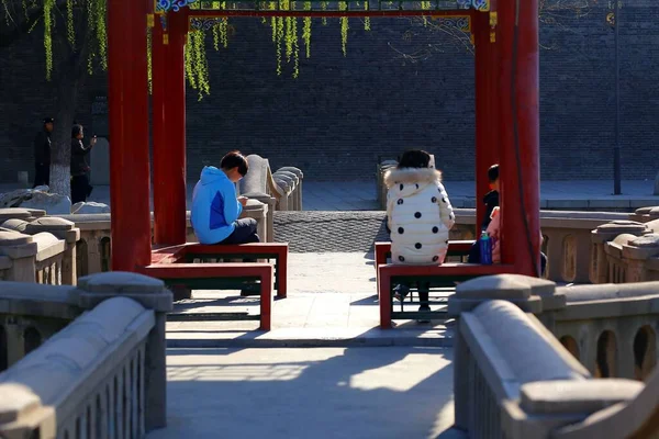 a group of people in the park