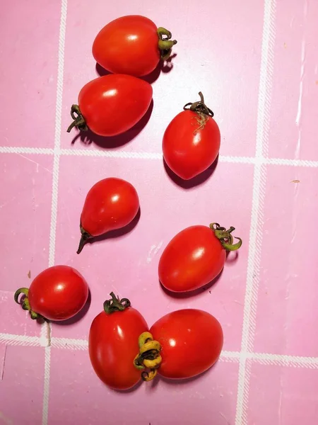 tomatoes and tomato on a white background