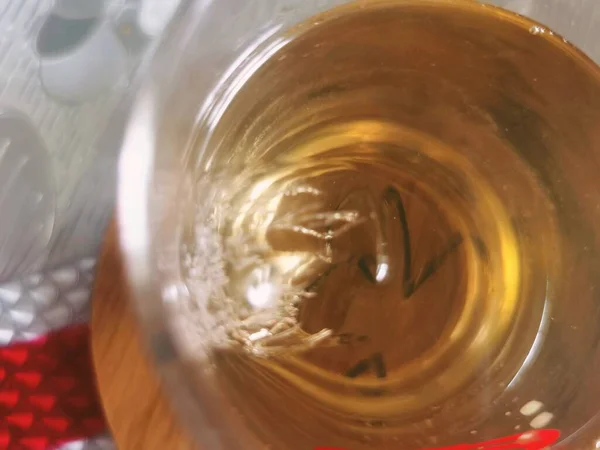 a closeup shot of a glass of wine