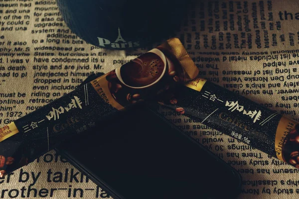 old book with a bible and a cup of coffee