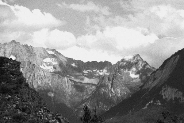 black and white photo of a mountain landscape