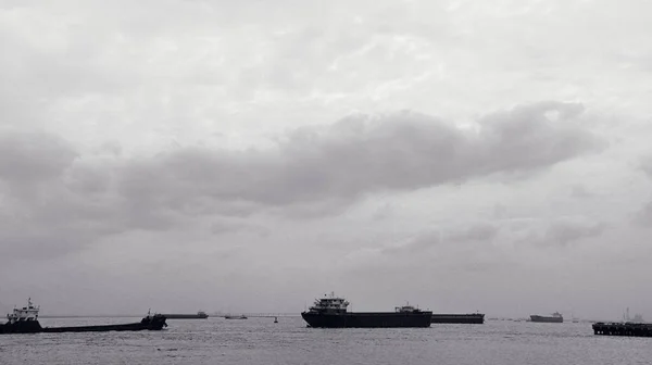 black and white photo of a large cargo ship