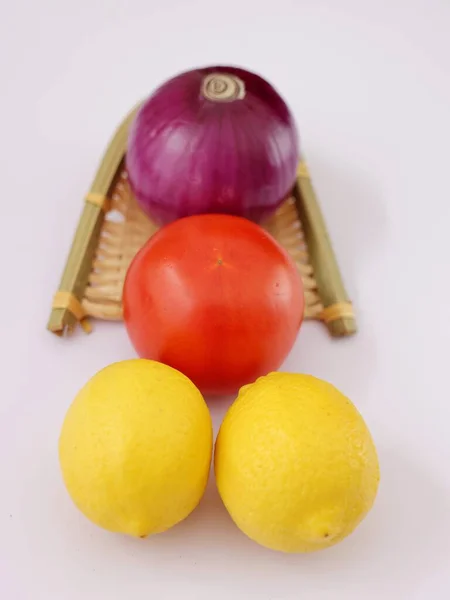 fresh tomatoes and tomato on white background