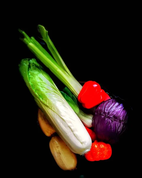 fresh vegetables on black background