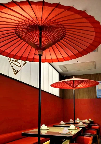 red umbrella in the cafe