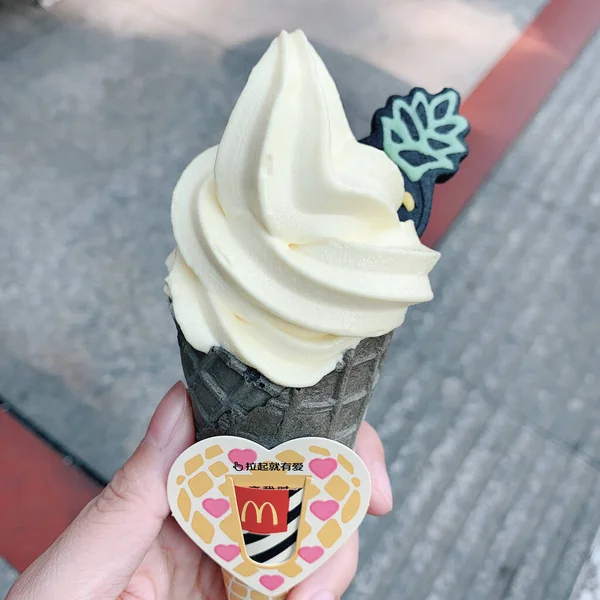 ice cream in a cup on a stick