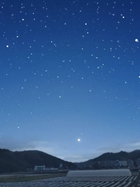 night sky with stars and snow