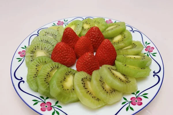 fresh fruit salad with strawberries and kiwi