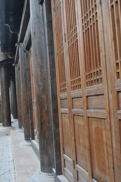 stock image old wooden door in the city