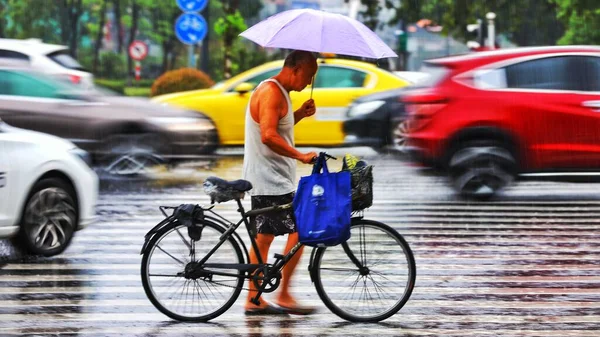man with umbrella in the city
