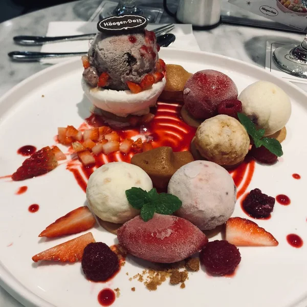 stock image chocolate ice cream with berries and strawberries