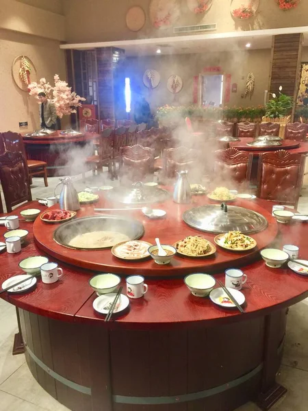 restaurant table with a variety of food