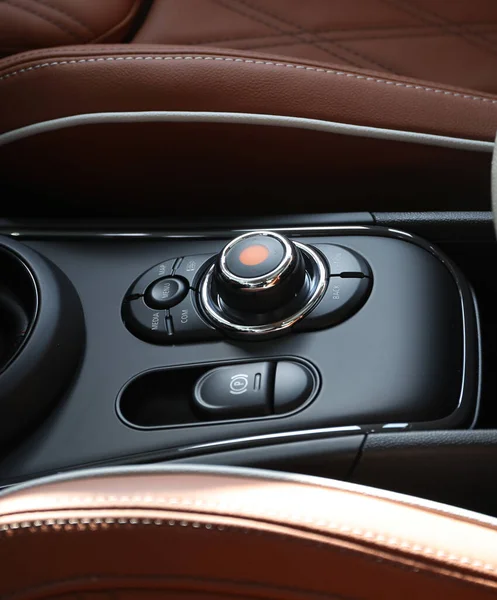 modern car interior with red and black buttons