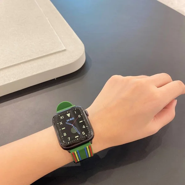 female hand with smartwatch on wrist watch