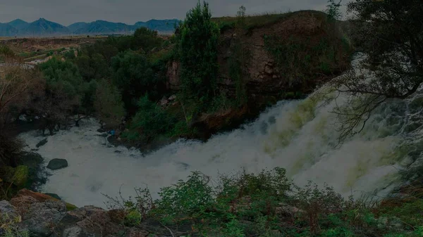 beautiful landscape with a waterfall