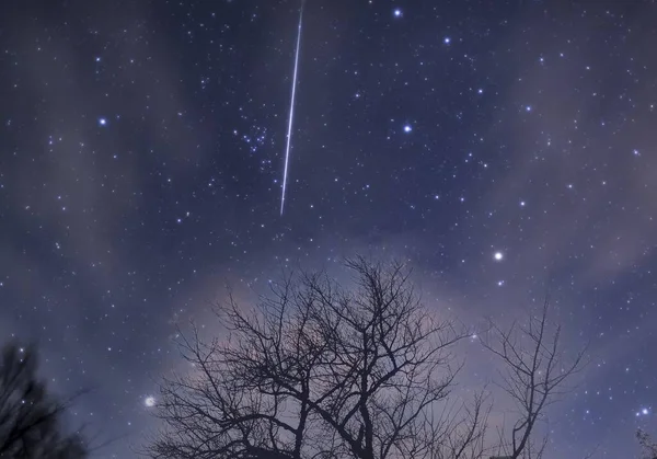 night sky with stars and snow