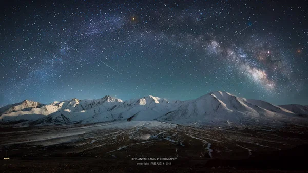 beautiful mountain landscape with mountains and stars