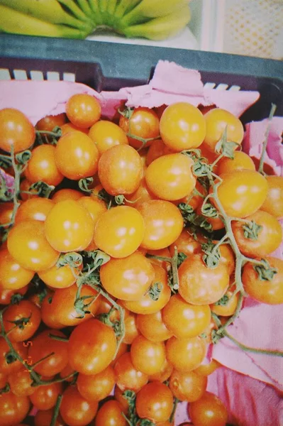 fresh red tomatoes on a market stall