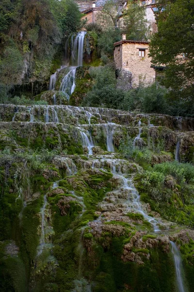 Turquoise water waterfall in Orbaneja del Castillo. — ストック写真