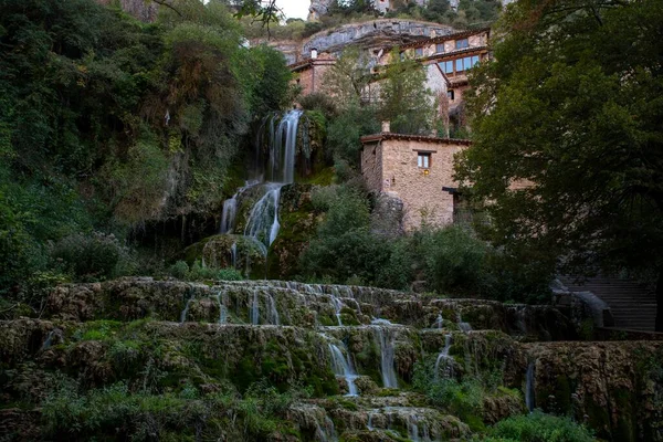 Turquoise water waterfall in Orbaneja del Castillo. — ストック写真