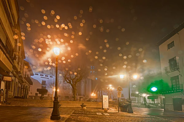 Main Square under the fog in the city Baza in Granada. — Fotografia de Stock