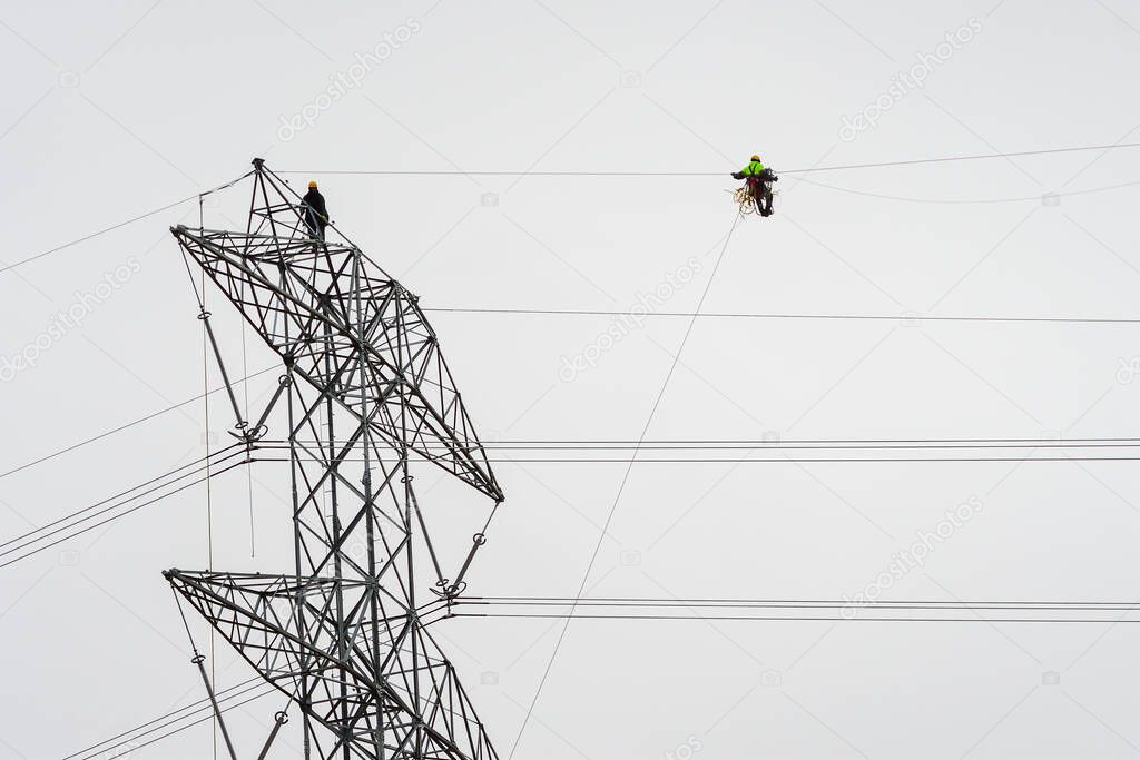 Installation and assembly of high-rise electrical towers.
