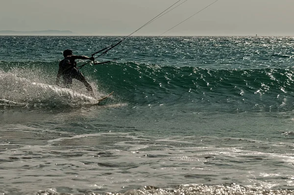 Young Professional Kitesurfer Rides Board Surface Sea Sunset —  Fotos de Stock