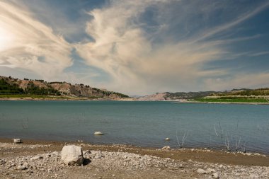 Reservoir with very low water level due to climate change and drought