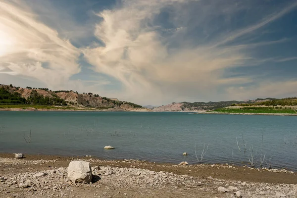 Reservoir with very low water level due to climate change and drought