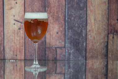 Ice cold mug of beer served in a bar