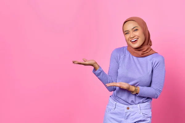 Portrait Smiling Young Asian Woman Showing Copy Space Palm Isolated — Stock Photo, Image