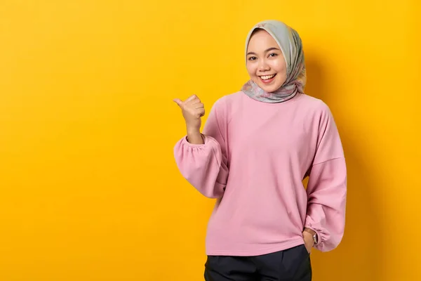 Cheerful Young Asian Woman Pink Shirt Pointing Fingers Copy Space — Stock Photo, Image