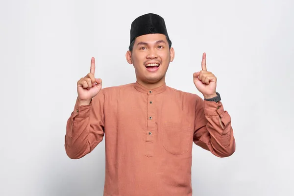Cheerful Young Asian Muslim Man Pointing Fingers Isolated White Background — Stock Photo, Image