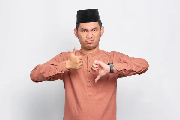 Serious Young Asian Muslim Man Showing Thumbs Decision Isolated White — Stock Photo, Image