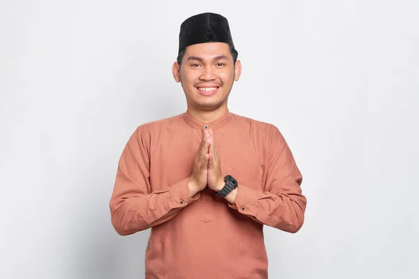 Smiling Young Asian Muslim Man Gesturing Eid Mubarak Greeting Isolated — Stock Photo, Image